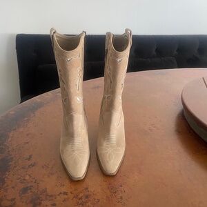 Woman’s suede cowboy boots with heel